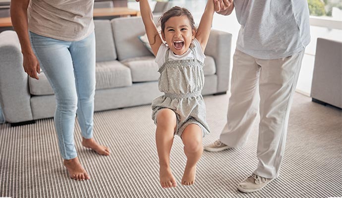 Happy family on carpet