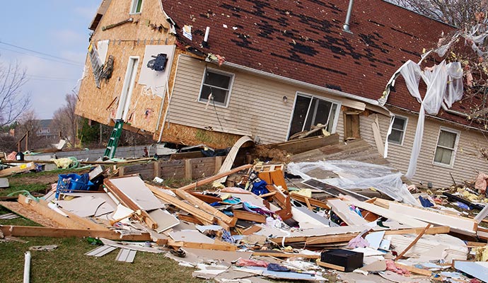 a destroyed large house from hurricane