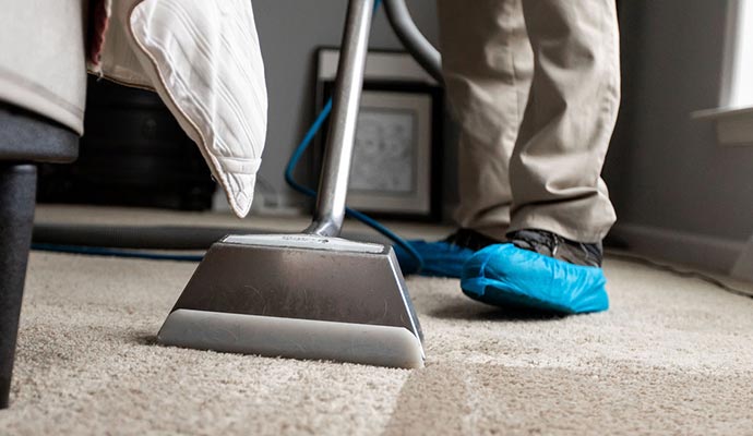 cleaning carpet with a machine