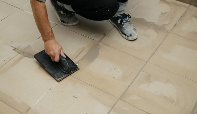 Tile grout sealing