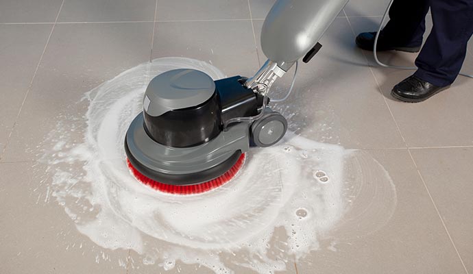 Professional tile cleaning using equipment