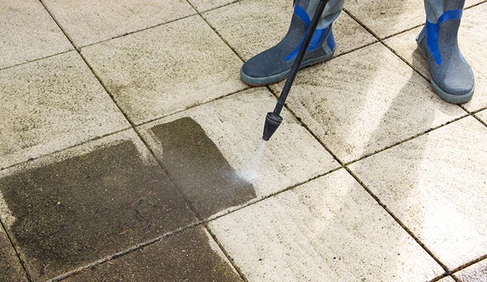 Professional tile cleaning with pressure washing